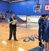 Coach Colin Everson at a home playoff game on Mar. 6.  Photo by Sterling Anderson